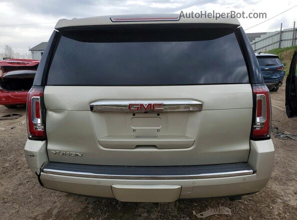 1GKS2CKJ4GR164615 2016 GMC YUKON Золотой Вид салона спереди