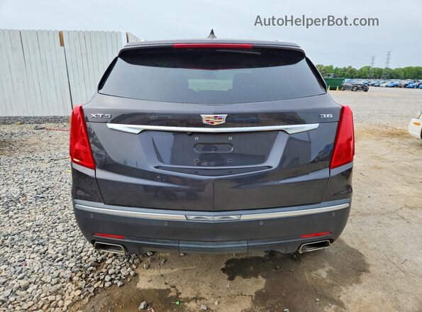 1GYKNCRS6HZ184863 2017 CADILLAC XT5 Серый Вид салона спереди