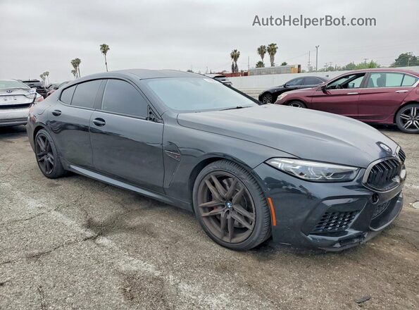 WBSGV0C02NCG90430 2022 BMW M8 Black Front view