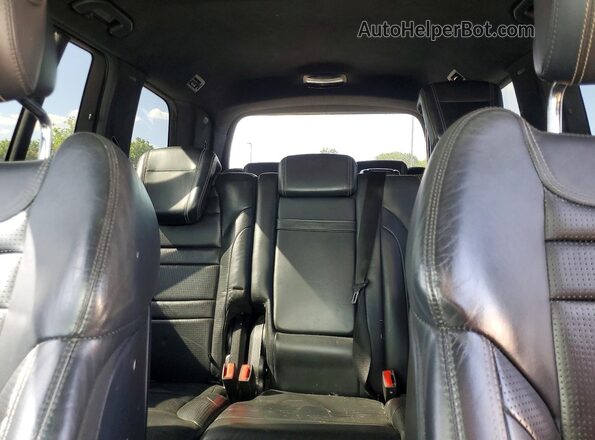 4JGDF7EE3GA670753 2016 MERCEDES-BENZ GL-CLASS White Vista de los asientos traseros
