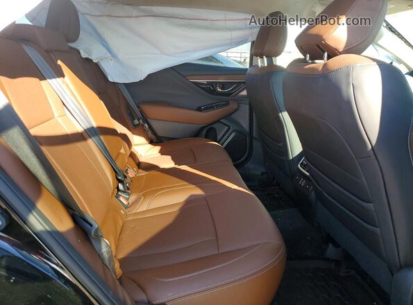 4S4BTGPDXR3281717 2024 SUBARU OUTBACK Черный Вид задней части салона