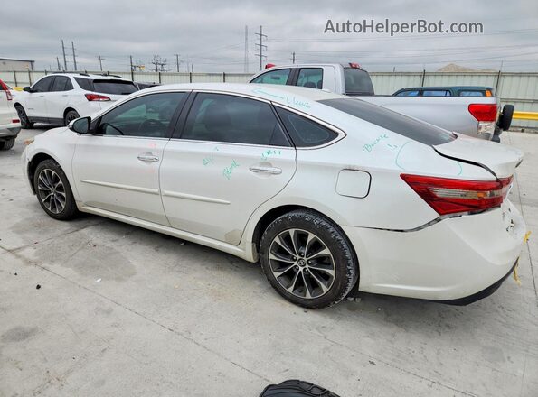 4T1BK1EB1GU217977 2016 TOYOTA AVALON White Rear left