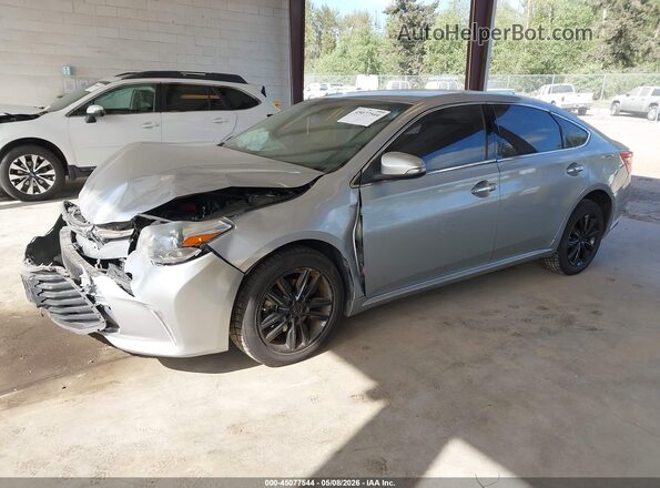 4T1BK1EB6JU285425 2018 TOYOTA LE Серебряный Передняя левая четверть