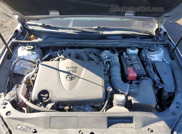 4T1BZ1FB5KU024234 2019 TOYOTA LE Серебряный Вид задней части салона