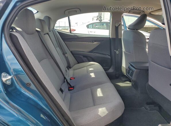 4T1DAACK6SU099075 2025 TOYOTA CAMRY Blue Vista de los asientos traseros