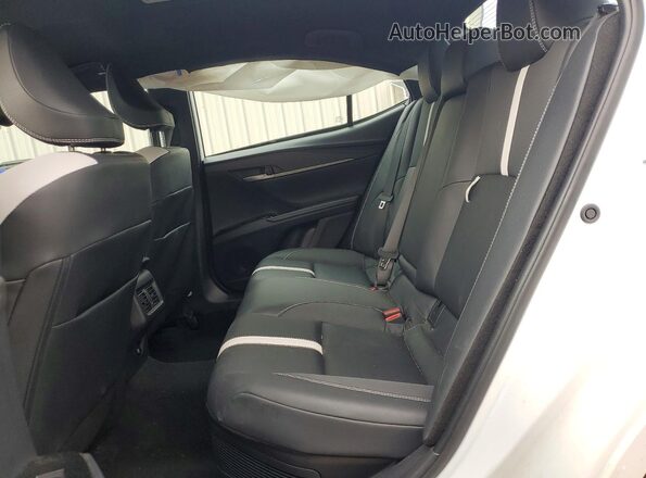 4T1DAACKXTU696716 2026 TOYOTA CAMRY White Vista de los asientos traseros