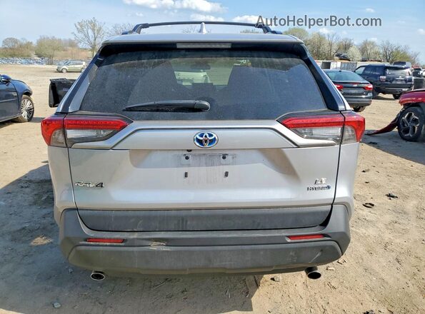 4T3MWRFV7PU084380 2023 TOYOTA LE Silver Вид ззаду
