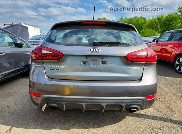 KNAFZ5A35G5592172 2016 KIA FORTE Серебряный Вид салона спереди