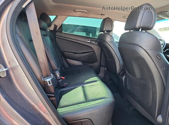 KM8J33A23GU239506 2016 HYUNDAI TUCSON Gray Vista del compartimento del motor