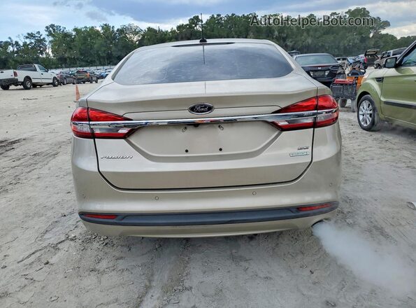 3FA6P0HD8HR290373 2017 FORD FUSION Золотой Вид салона спереди
