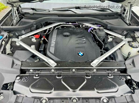 5UX23EM05P9R82524 2023 BMW X7 White Widok wnętrza z przodu