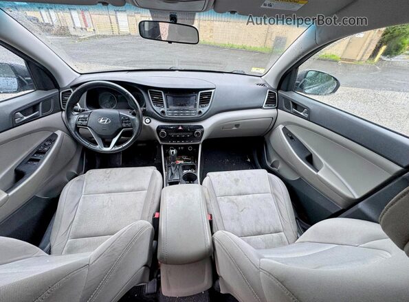 KM8J3CA2XGU194869 2016 HYUNDAI TUCSON Gray Vista del cuadro de instrumentos