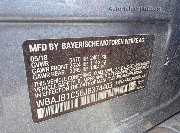WBAJB1C56JB374403 2018 BMW OTHER Charcoal Вид задньої частини салону