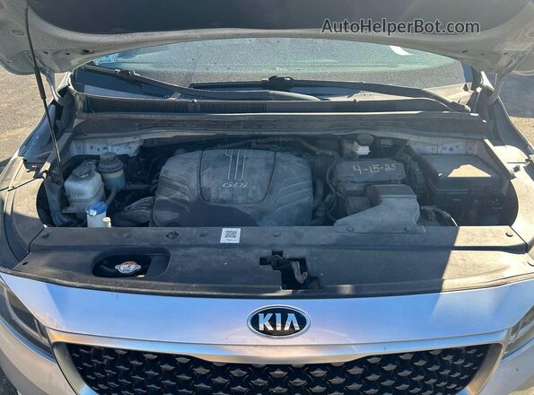 KNDMA5C1XH6264741 2017 KIA SEDONA Серый Вид салона спереди