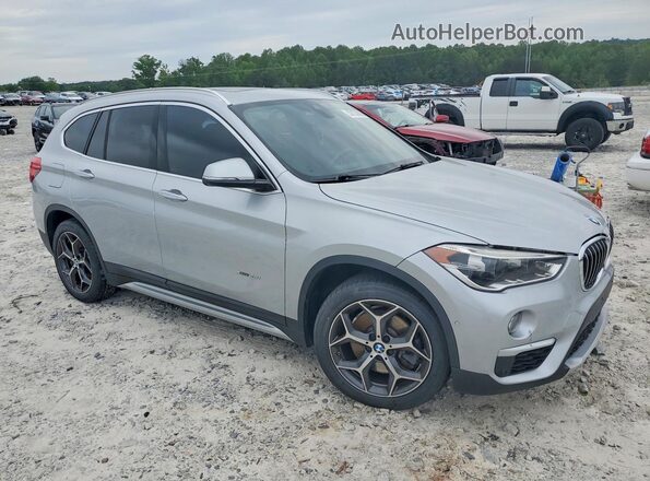 WBXHT3Z30G4A50978 2016 BMW X1 Silver Вид спереду