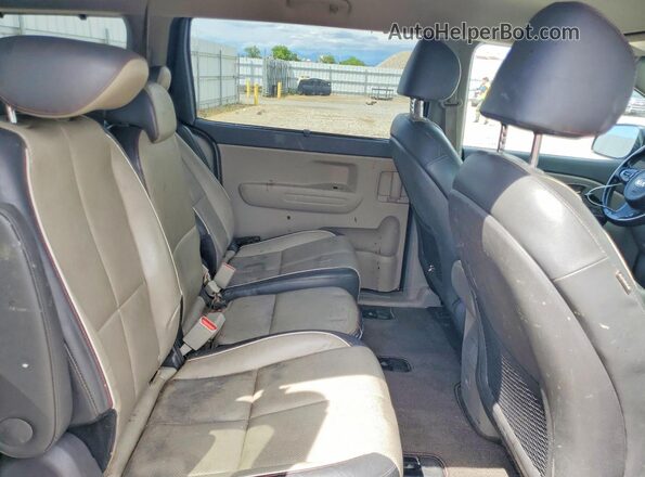 KNDMB5C12H6245078 2017 KIA SEDONA Gray Vista interior trasera