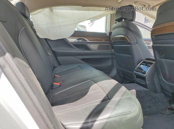 WBA7F0C50JGM23722 2018 BMW OTHER Silver Widok wnętrza z tyłu