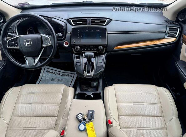 2HKRW2H85JH602943 2018 HONDA CR-V White Vista de los asientos traseros
