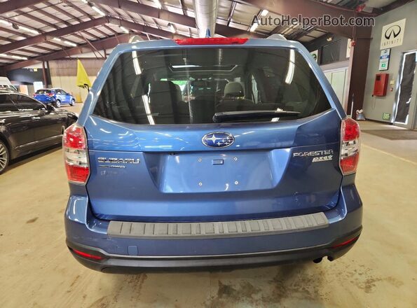 JF2SJADC8GH448726 2016 SUBARU FORESTER Blue Вид салону спереду