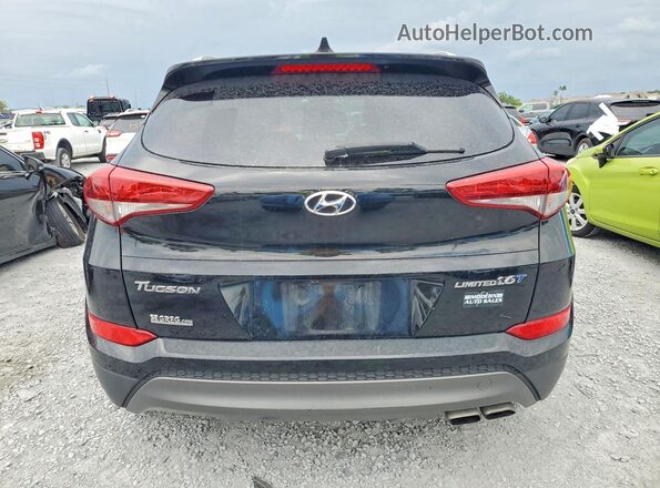 KM8J33A27GU197681 2016 HYUNDAI TUCSON Черный Вид салона спереди