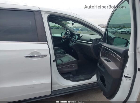 5FNRL6H79LB030414 2020 HONDA ODYSSEY Белый Вид салона спереди