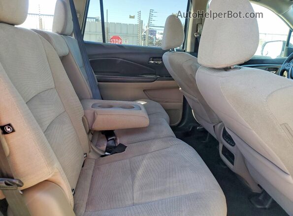 5FNYF5H34JB000440 2018 HONDA PILOT Белый Вид задней части салона