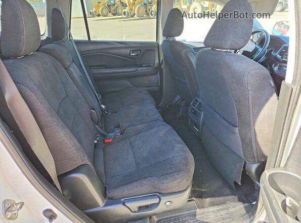 5FNYF5H39KB025559 2019 HONDA PILOT White Rear interior view