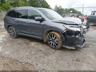 2022 Honda Pilot 2wd Touring 7 Passenger Gray vin: 5FNYF5H62NB017804