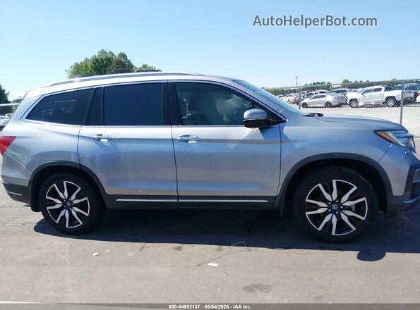 5FNYF5H66KB023097 2019 HONDA PILOT Серебряный Вид задней части салона