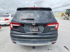 2021 Honda Pilot Touring Черный vin: 5FNYF5H93MB000342