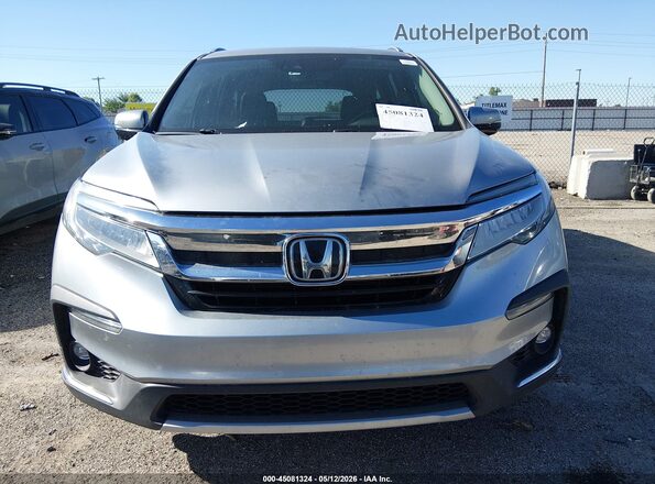 5FNYF6H05KB003117 2019 HONDA PILOT Серый Вид задней части салона
