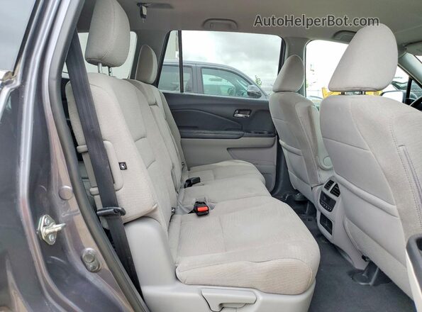5FNYF6H33JB050610 2018 HONDA PILOT Gray Rear interior view