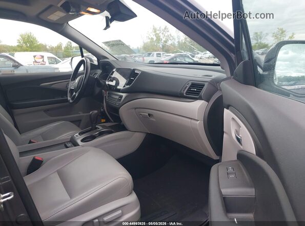 5FNYF6H52KB048365 2019 HONDA PILOT Серый Вид салона спереди