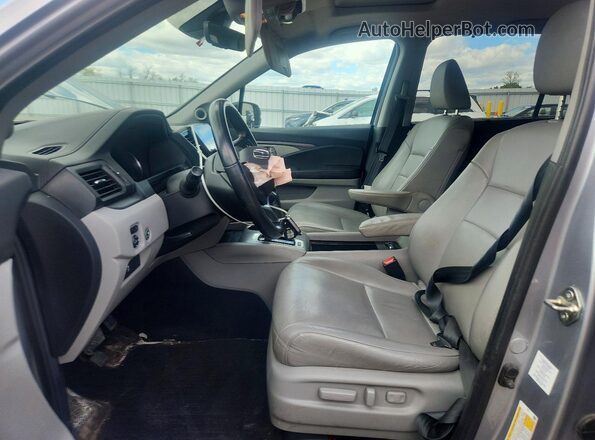 5FNYF6H52KB069863 2019 HONDA PILOT Серебряный Вид салона спереди