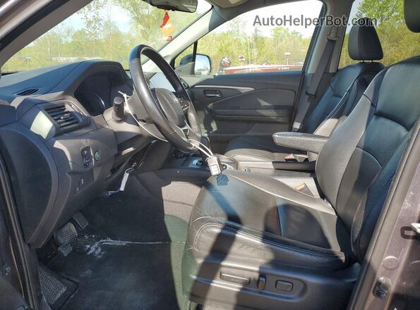 5FNYF6H55KB099830 2019 HONDA PILOT Gray Front interior view