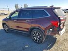 2021 Honda Pilot Touring Burgundy vin: 5FNYF6H6XMB044687