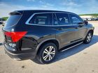 2018 Honda Pilot Exln Черный vin: 5FNYF6H76JB037384