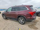 2016 Honda Pilot Touring Burgundy vin: 5FNYF6H97GB096549