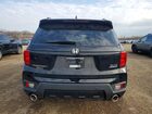 2023 Honda Passport Elite Черный vin: 5FNYF8H01PB008902