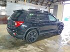 2020 Honda Passport Elite Черный vin: 5FNYF8H0XLB010822