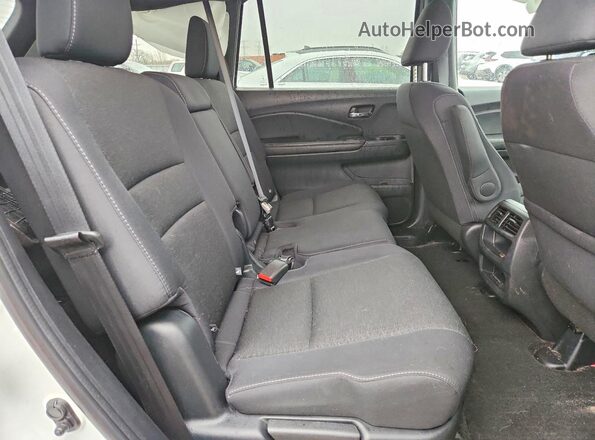 5FNYF8H21KB028061 2019 HONDA PASSPORT White Rear seats view