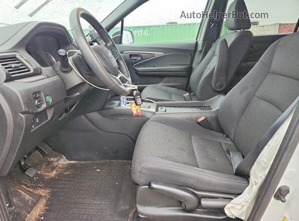 5FNYF8H21KB028061 2019 HONDA PASSPORT White Front interior view