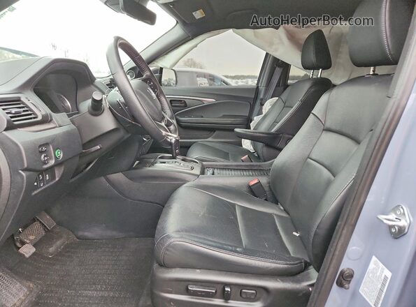 5FNYF8H52PB003221 2023 HONDA PASSPORT Синий Вид салона спереди
