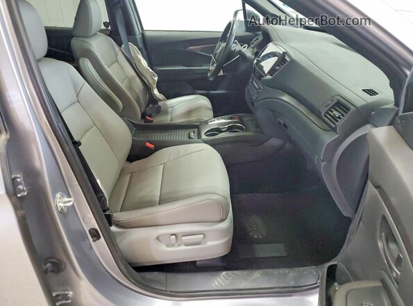 5FNYF8H54PB034339 2023 HONDA PASSPORT Silver Vista interior delantera