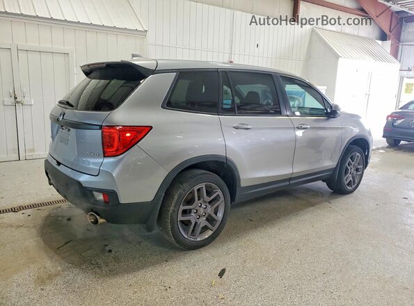 5FNYF8H54PB034339 2023 HONDA PASSPORT Silver Trasero derecho