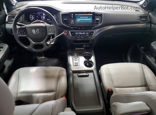 5FNYF8H54PB034339 2023 HONDA PASSPORT Silver Vista del salpicadero