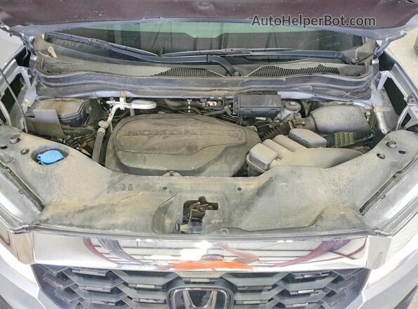 5FNYF8H54PB034339 2023 HONDA PASSPORT Silver Vista del compartimento del motor