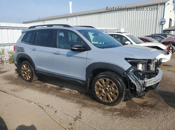 5FNYF8H95PB501125 2023 HONDA PASSPORT Blue Delantero derecho