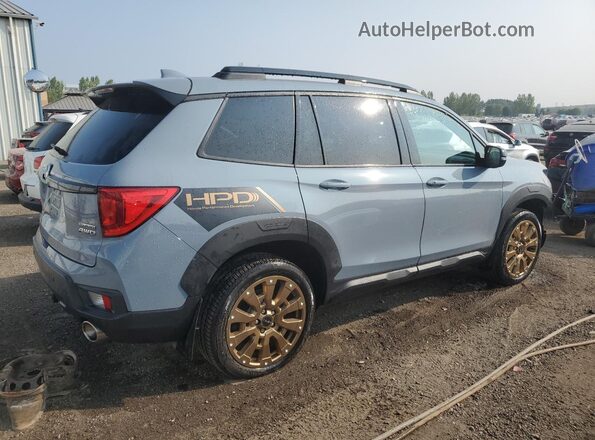 5FNYF8H95PB501125 2023 HONDA PASSPORT Blue Trasero derecho