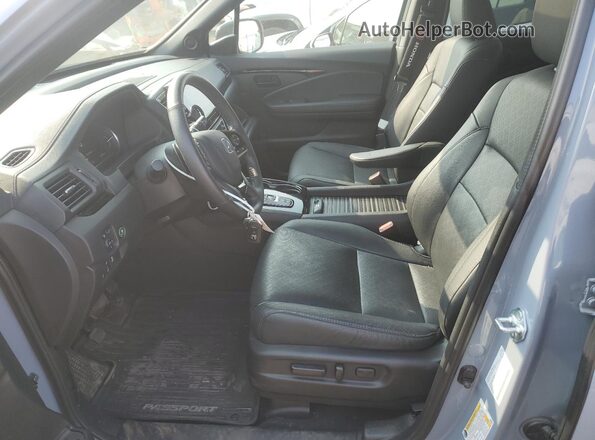 5FNYF8H95PB501125 2023 HONDA PASSPORT Blue Vista interior delantera